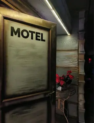 a metal door with the word motel written on it at MOTEL Route 80 in Bozhurishte