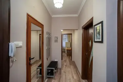 a hallway with a door and a hallway with a hallway at Alex's Charming Apartment by NDK in Sofia