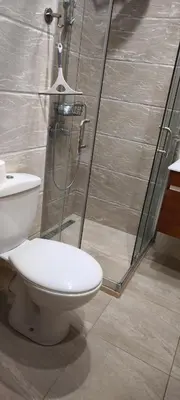 a bathroom with a toilet and a shower at One Bedroom Apartment 4 - Restaurant Stadium Plovdiv in Plovdiv