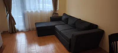 a living room with a couch and a chair at One Bedroom Apartment 2 - Restaurant Stadium Plovdiv in Plovdiv
