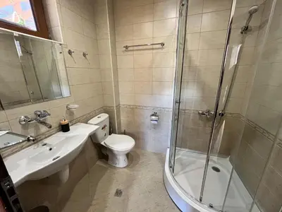 a bathroom with a shower and a toilet and a sink at Къща за гости в село Проглед - комплекс Божидарица 4А in Progled