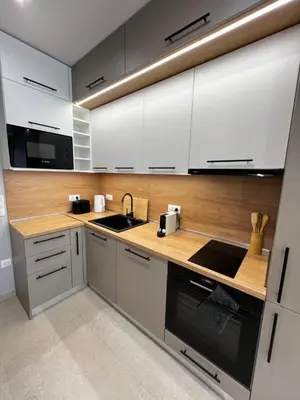 a kitchen with white cabinets and a sink at Monaco 100 Sq M 3BDR Apt on Oborishte street with WiFi in Sofia