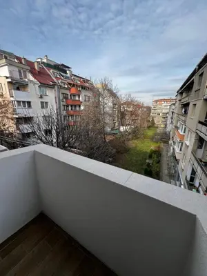 a balcony with a view of a city with buildings at Monaco 100 Sq M 3BDR Apt on Oborishte street with WiFi in Sofia