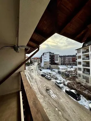 a view of a street from a balcony of a building at Gino's place Home2Host in Bansko