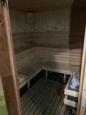 an empty sauna with wooden flooring and a wooden at Sasha Yo in Razlog