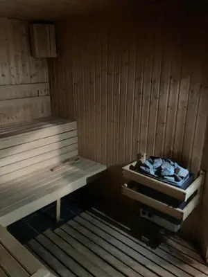 an empty sauna with two beds in it at Sasha Yo in Razlog