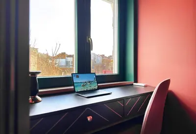 a desk with a laptop sitting on a window sill at Central 2BR with Designer Interior and Work Desk in Sofia