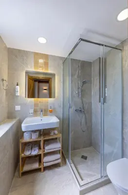 a bathroom with a shower and a sink at Luxurious, modern house in the nature in Belchin in Belchin