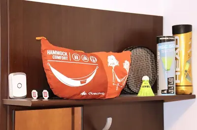 an orange pillow on top of a shelf at Rila Morning in Borovets