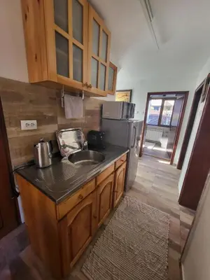 a kitchen with a sink and a counter top at Къща за гости Йони in Teteven