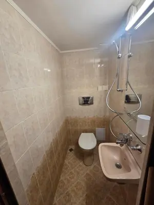 a bathroom with a toilet and a sink at Smart Budget Stay at Sofia Centre by NDK and Vitosha Blvd in Sofia