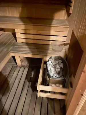 an overhead view of a sauna with a bowl of rocks at The View Bansko in Bansko