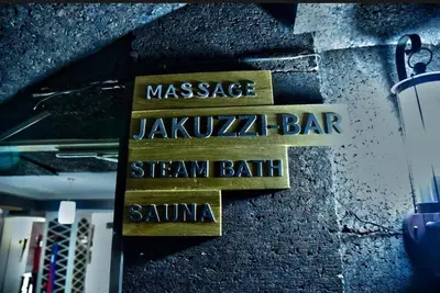 a sign that says massage jabiruzz bar and steam bathenna at Deluxe Apartment in Bansko