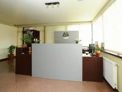 an office with a large white counter in a room at Ring Hotel in Blagoevgrad