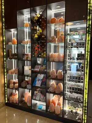 a display case filled with lots of different types of bread at Family Hotel Ognyanovo in Ognyanovo