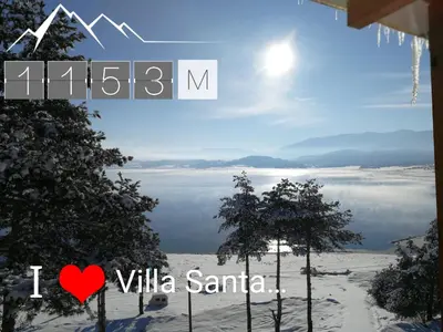 a picture of a winter view of a lake at Villa Santa Maria in Tsigov Chark