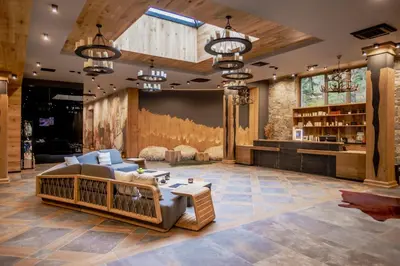 a living room with a couch and a table at Kashmir Wellness & SPA Hotel Adults Only in Velingrad