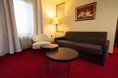 a living room with a couch and a table at Famous House in Plovdiv