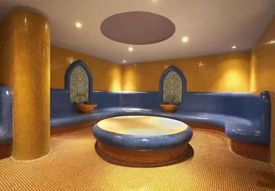a room with a table in the middle of a room at Borovets Hills Ski & Spa - Half Board in Borovets