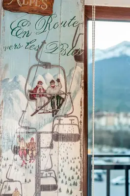 a picture of people on a ski lift at Mountain Paradise 4 Apartments in Bansko