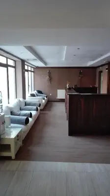 a large living room with couches and a bar at Mountain Top Mina in Bansko