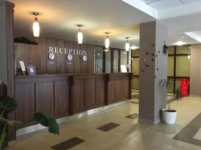 a reception lobby of a hospital with a reception desk at Rivendell Apartments Borovets Gardens complex in Borovets