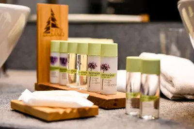 a group of four products sitting on a counter at Hotel Arte SPA & Park in Velingrad