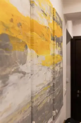 a painting on a wall in a room at Lozenets Apartment in Sofia