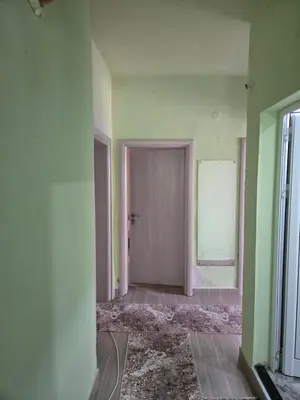 an empty room with a door in the middle at Apartment Lachevi in Sandanski