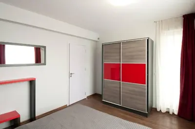 a room with a large glass door with a window at Sofia Top Apartments in Sofia