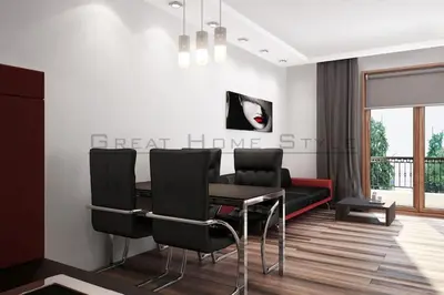 a dining room with a table and black chairs at Sofia Top Lux Apartment in Sofia