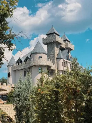 a castle like building on top of a hill at Royal Valentina Castle in Ognyanovo