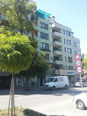 a white van parked in front of a building at Central Studio Maritsa in Plovdiv