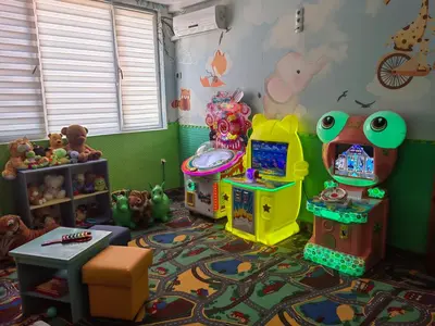 a childs play room with many toys in it at Balneo & SPA Hotel Aura in Velingrad