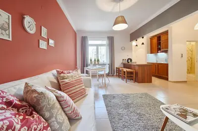 a living room with a couch and a table at Apartment 11 in Sofia