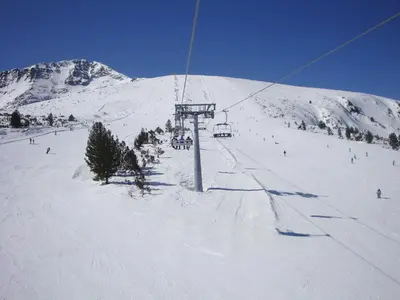 a ski lift on a snow covered mountain at LVV Pirin Golf Villa in Bansko