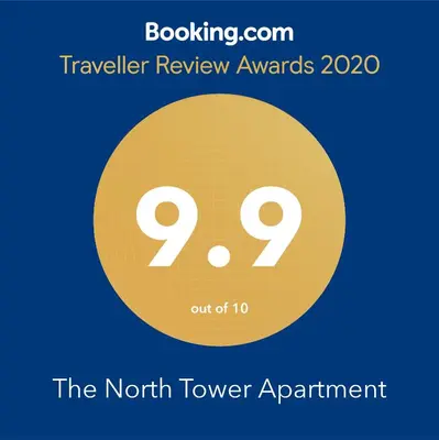 a sign that reads the north tower apartment with the north tower apartments at The North Tower Apartment in Sofia