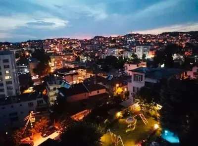 a view of a city at night with lights at Guest House Sofia in Sandanski