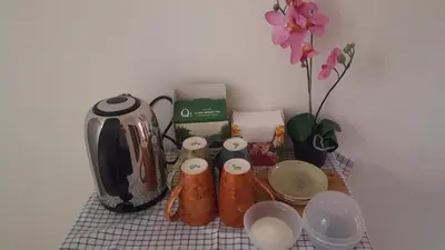 a counter top with a coffee maker and a blender at Guest House - Batak in Batak