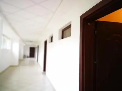 an open door in a hallway of a building at Ma-Bebe SPA Suite - Thermal Jacuzzi and Family Comfort in Pchelin