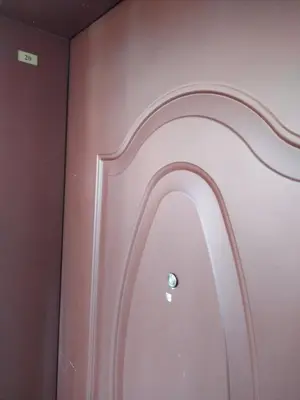 a room with a pink wall with a door at Ma-Bebe SPA Suite - Thermal Jacuzzi and Family Comfort in Pchelin