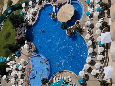 an overhead view of a pool at a resort at Park Hotel Sankt Peterburg in Plovdiv