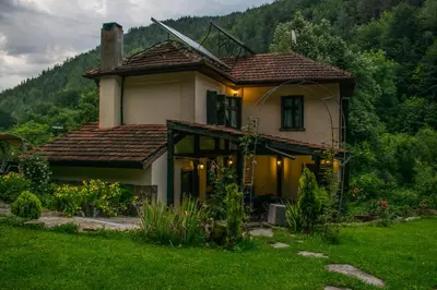 a small house in the middle of a field at Guest House Verbena in Apriltsi