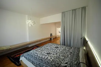 a bedroom with a bed in a room at Architectural City Loft in Sofia