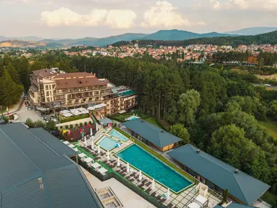 an aerial view of a resort with a swimming pool at SPA Hotel Infinity Park Velingrad in Velingrad
