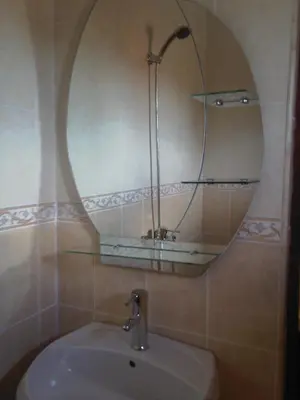 a bathroom with a sink and a mirror at Guest House PIP in Velingrad
