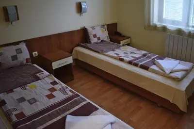 a room with two beds in a room at Hotel Jeravna in Bankya