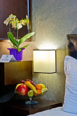 a bowl of fruit on a table in a hotel room at Spa Hotel Spartak in Sandanski