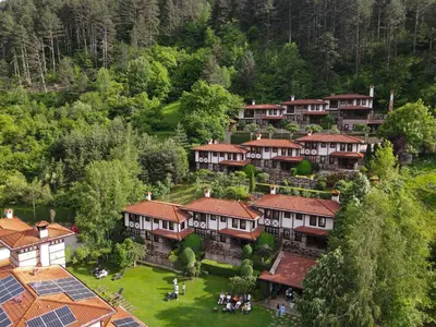 an aerial view of a village with houses at SPA Hotel Ismena in Devin