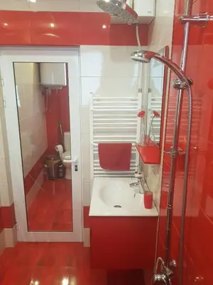 a bathroom with a sink and a shower at Guesthouse Jasmin in Sapareva Banya